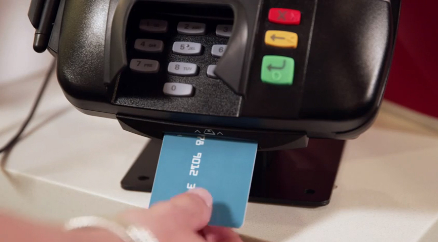 Image of chip card being inserted into chip card terminal reader